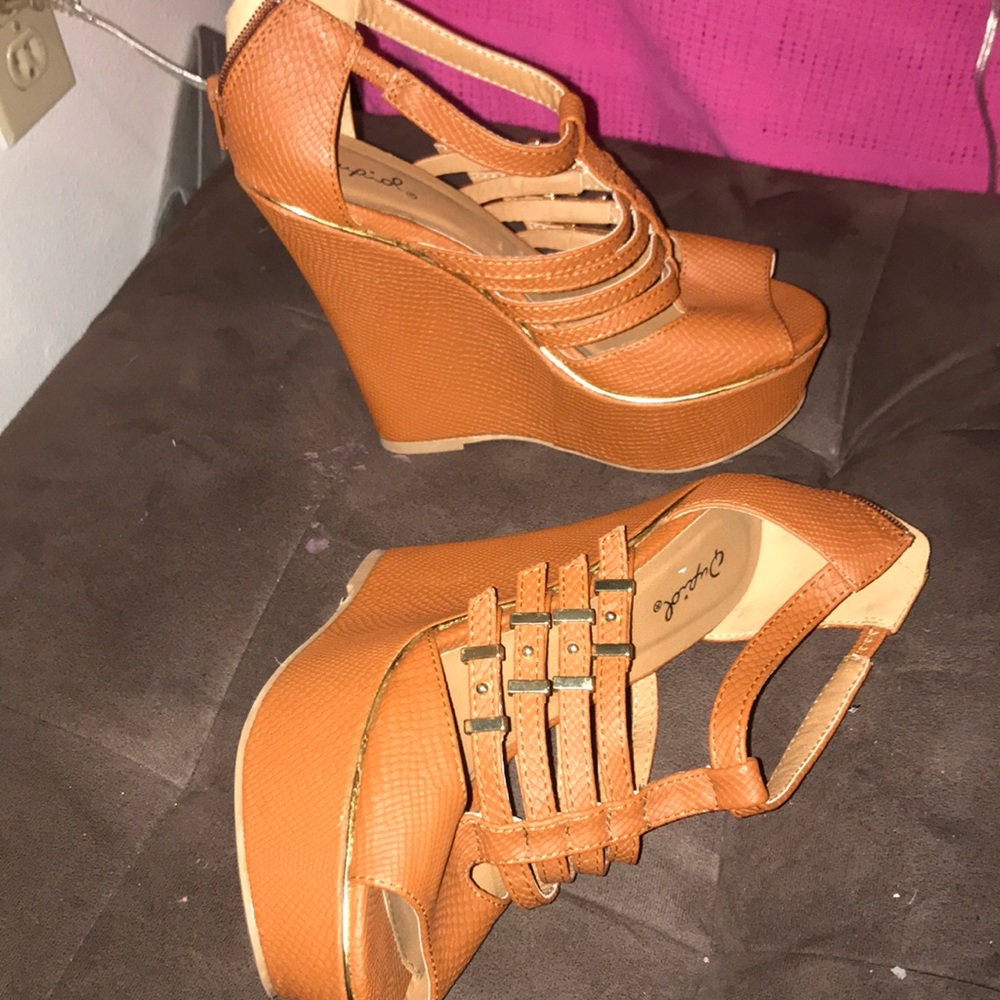 High heeled brown with gold. Size 7.